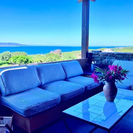 Rosso Lilu' Casa Con Vista Mozzafiato Sulla Pelosa * Стинтино
